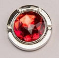 Circular-shaped Red-colored stone bag hook