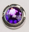 Circular-shaped Purple-colored stone bag hook