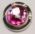 Circular-shaped Pink-colored stone bag hook