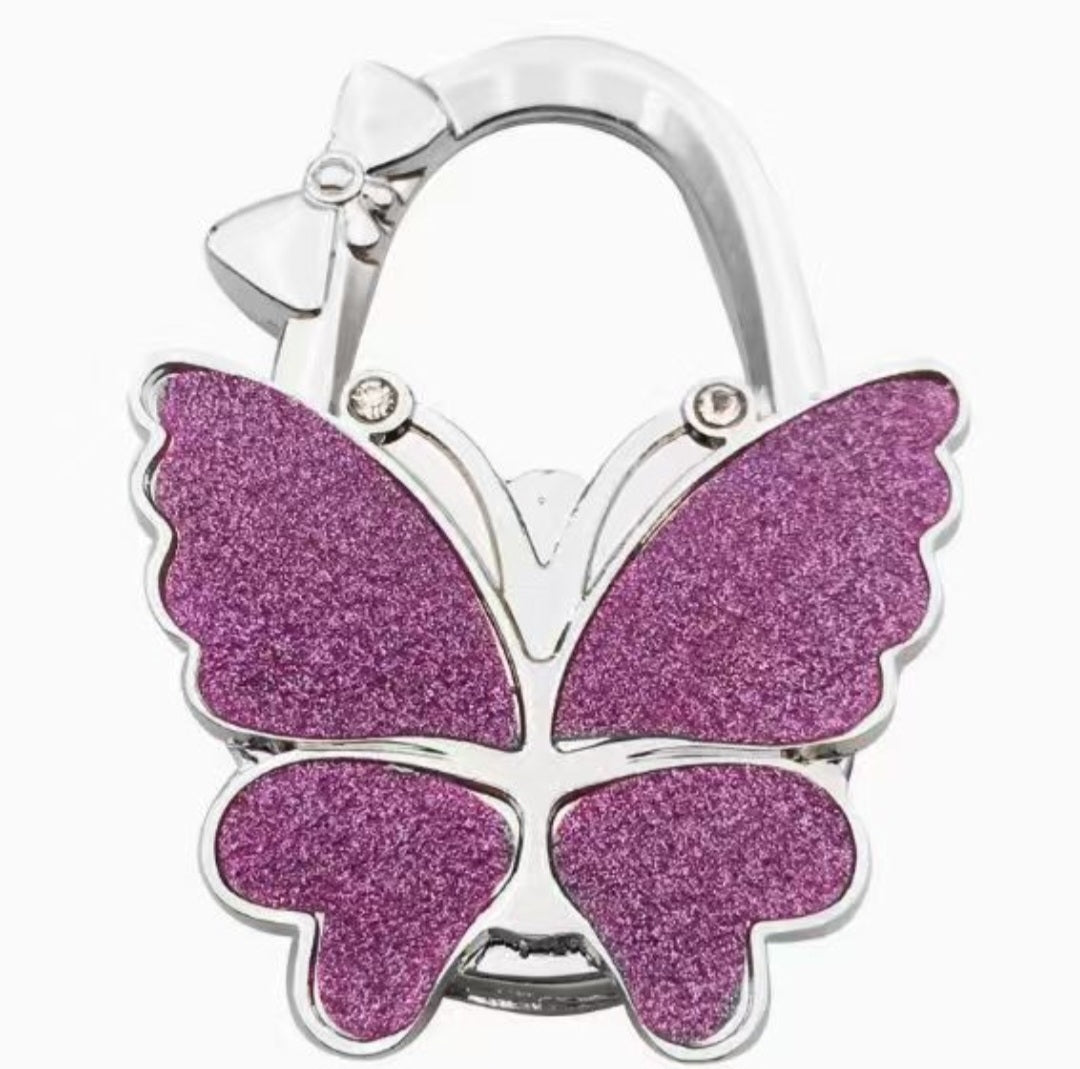 Glittery purplish-pink butterfly-shaped hook