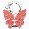 Sparkling coral-pink butterfly-shaped hook