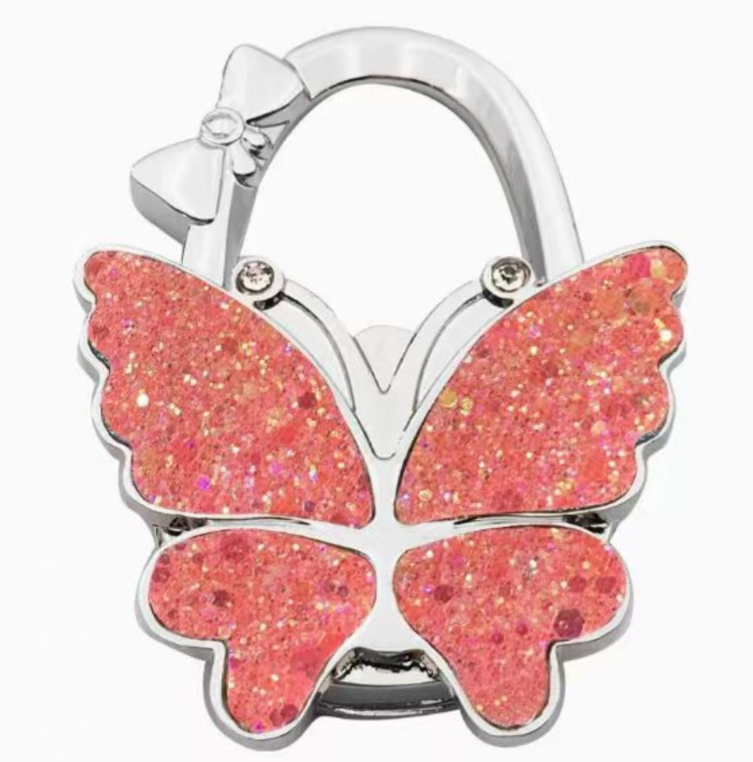 Sparkling coral-pink butterfly-shaped hook