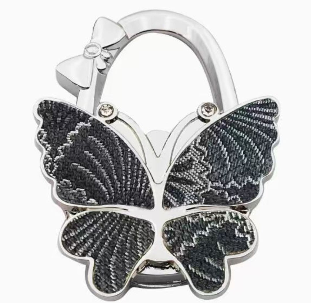 Multi-plotted black butterfly-shaped hook